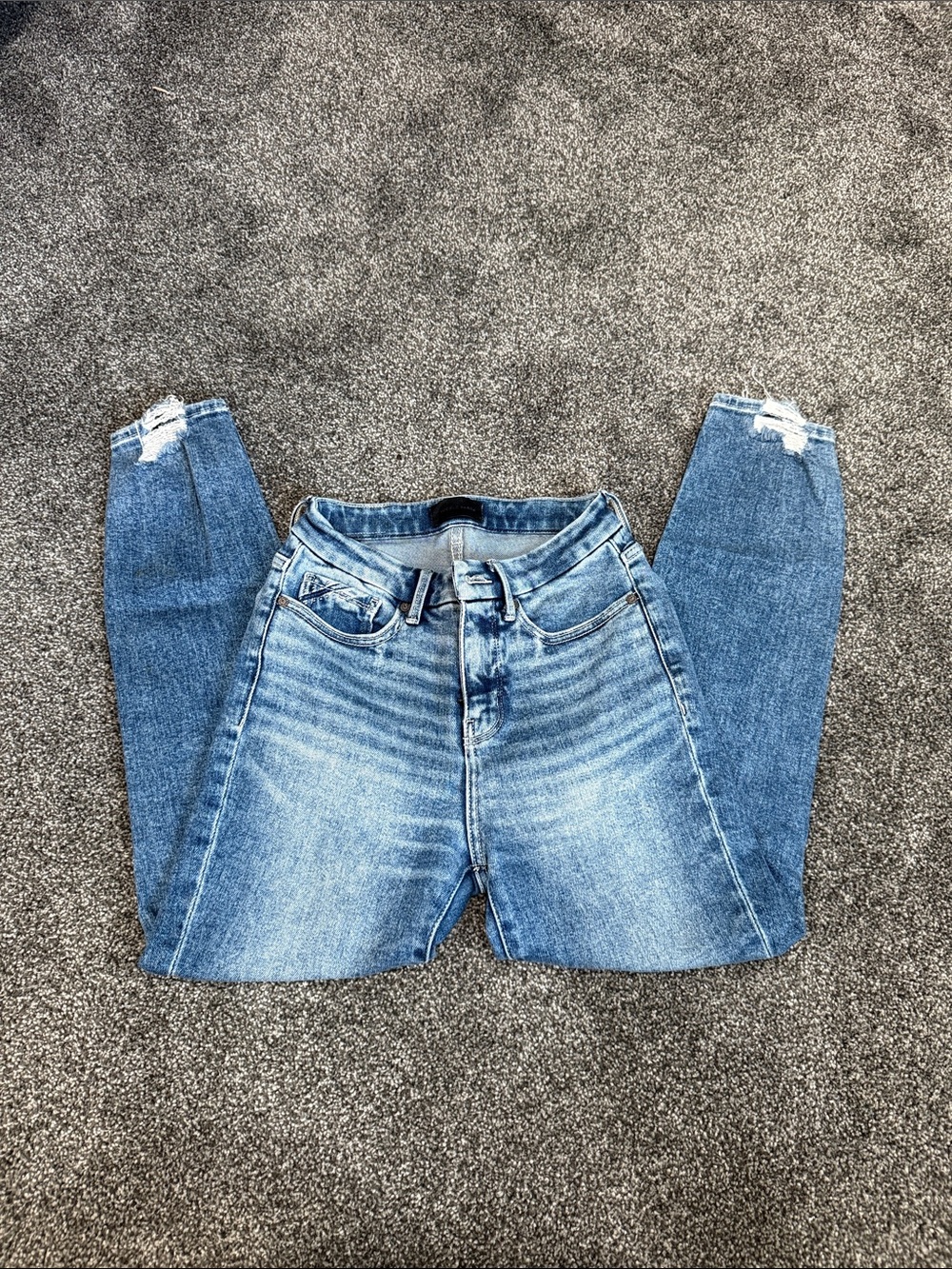 Buckle High-Rise Distressed Light Blue Jeans 25x27